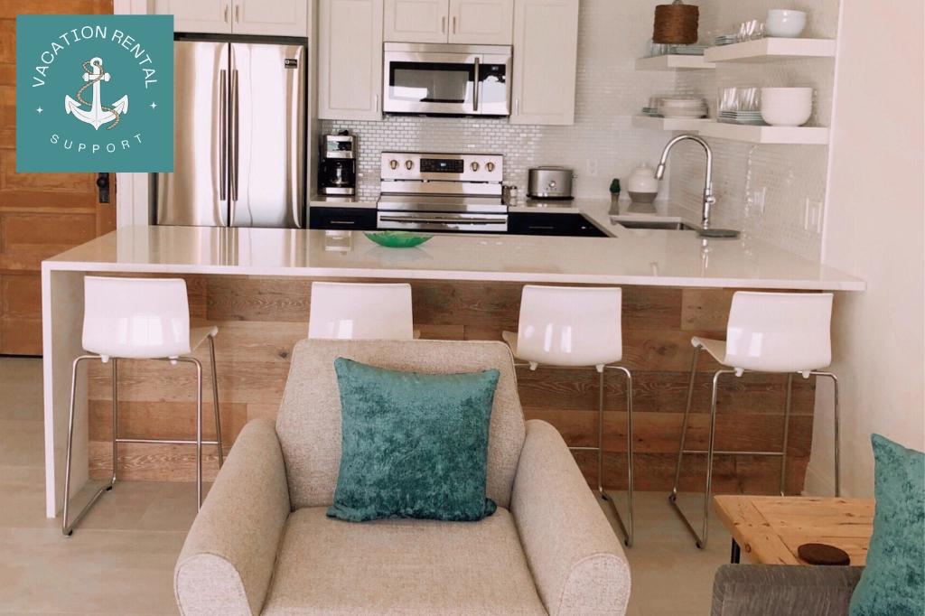 Vacation Rental Cleaning FAQs: Sparkling white kitchen showcasing professional departure cleaning services.