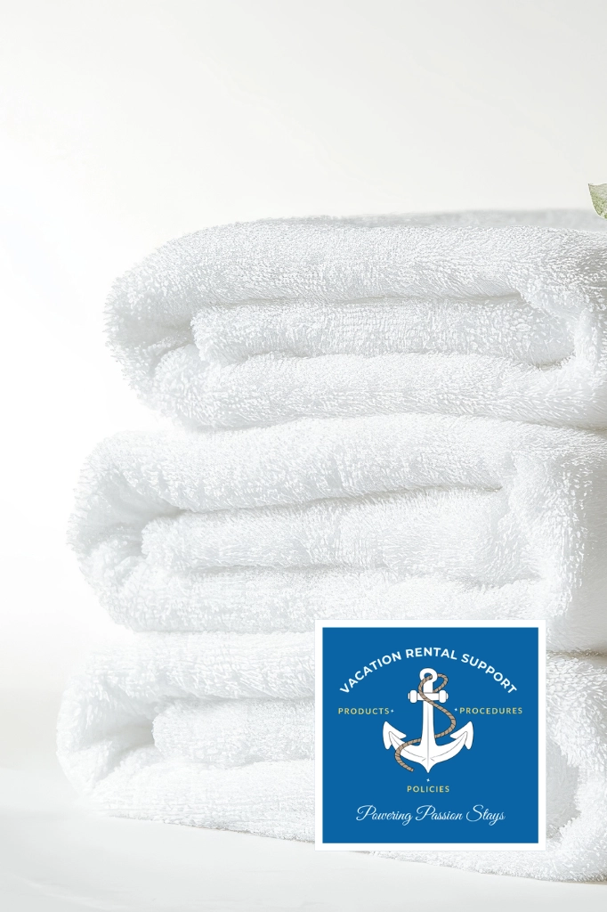 Folded white bath linens stacked with Vacation Rental Support logo for short-term rental bundles.